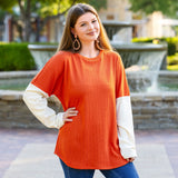 Orange ribbed long sleeve top white sleeves