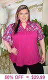 Magenta top with printed floral bubble sleeves