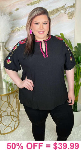 S, M, Large : Black top with embroidery details
