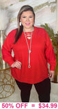 Red waffle knit with lace insets and criss cross neck