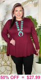 Maroon shark bite hem line top