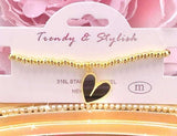 Black heart charm Gold beaded bracelet