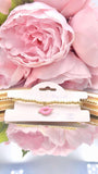 Pink Kiss charm gold beaded bracelet
