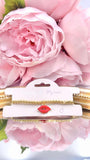 Red Kiss charm gold beaded bracelet