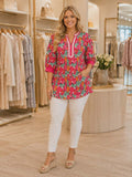 Pink printed blouse with stripe v-neck