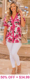 Pink floral blouse with stripe trim v-neck