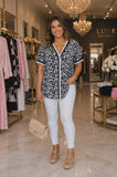 Leopard blouse with stripe trim v-neck