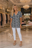 Leopard blouse with stripe trim v-neck