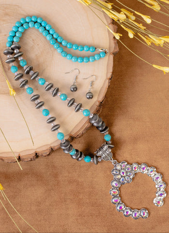 Turquoise necklace with silver squash pendant