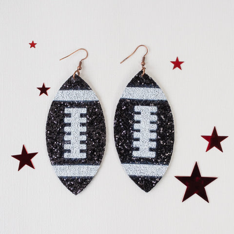 Black glitter football earrings