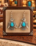 Silver Thunderbird earrings with turquoise stone