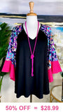 Black Top with purple leopard bell sleeves and pink ruffle trim