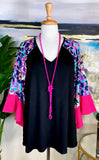 Black Top with purple leopard bell sleeves and pink ruffle trim