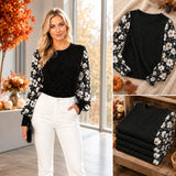 Black bling top with floral sleeves