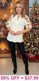 White top with embroidery sleeve detail