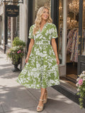 Green and white floral dress