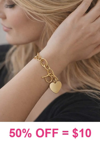 Gold chain bracelet with heart charm