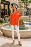 Orange top with chiffon sleeve