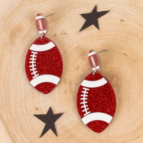 Red acrylic glitter football earrings