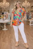 Orange tropical floral top