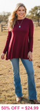 Maroon shark bite hem line top