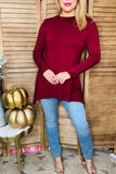 Maroon shark bite hem line top
