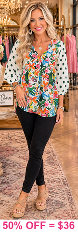 Floral blouse with polka dot sleeves