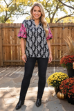Floral blouse with pink embroidery sleeves