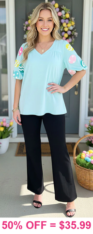 Blue top with Easter egg patch sleeves