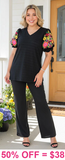 Black v-neck top with colorful embroidery puff sleeves