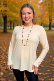 Cream long sleeve top