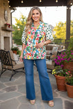 Floral blouse with polka dot sleeves