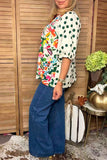 Floral blouse with polka dot sleeves