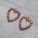 Copper heart outline earrings with bling