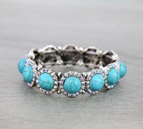 Turquoise round stone  with bling trim stretchy bracelet
