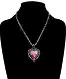 Pink speckled heart with silver border pendant necklace