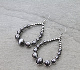 Silver Navajo pearl beaded teardrop earrings with bling
