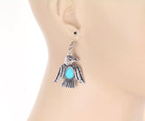 Silver Thunderbird earrings with turquoise stone