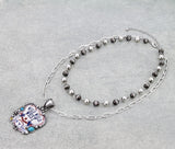 Double strand necklace with Wild West pendant