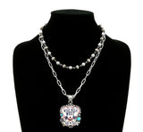Double strand necklace with Wild West pendant