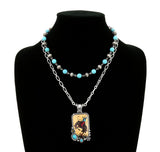 Double strand necklace with Bronc Rider pendant