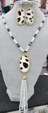 Crystal Necklace with Black White Cow Oval pendant & tassel