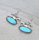 Bronc rider earrings with Turquoise oval