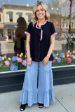 Large: Black top with pink leopard ruffle trim