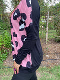 Pink leopard prints, black long sleeve top