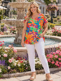 Orange tropical floral top