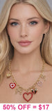 Gold Charm necklace with hearts and bows