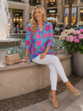 Blue top with pink floral print