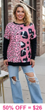 Pink leopard prints, black long sleeve top