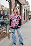 Pink leopard prints, black long sleeve top